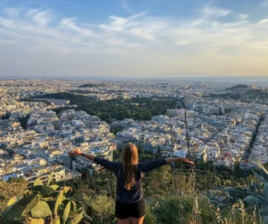 woman on the top with city view
