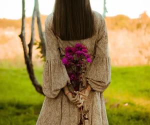 woman in dress with flowers
