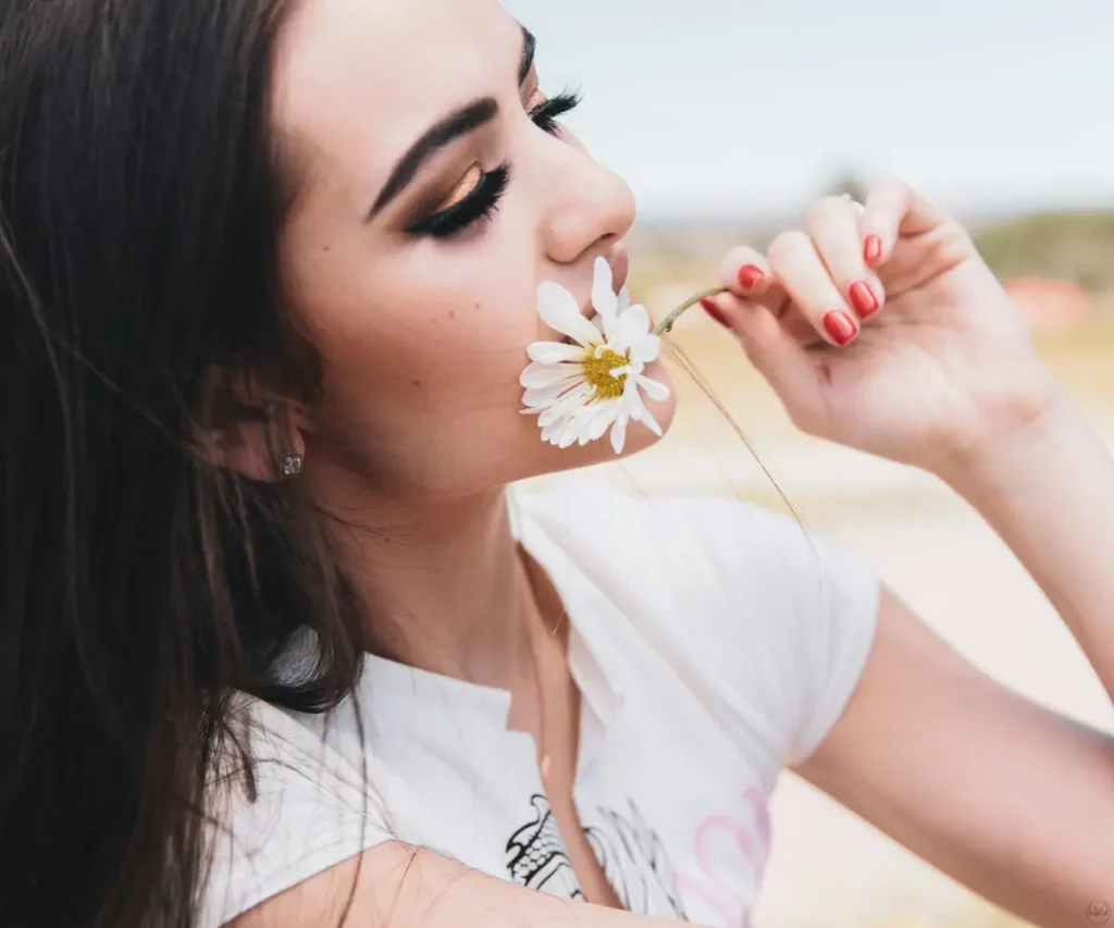 woman and daisy