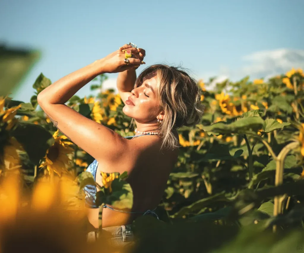 woman and sunflowers