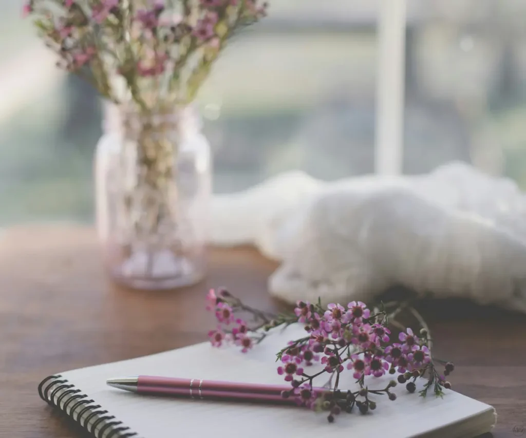 notebook and flowers