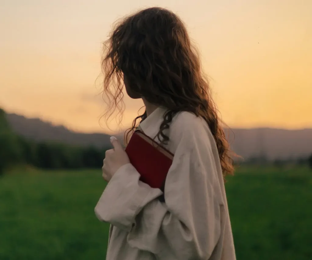 woman holding book