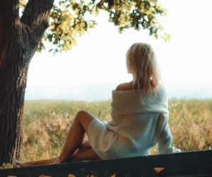 woman sitting in nature